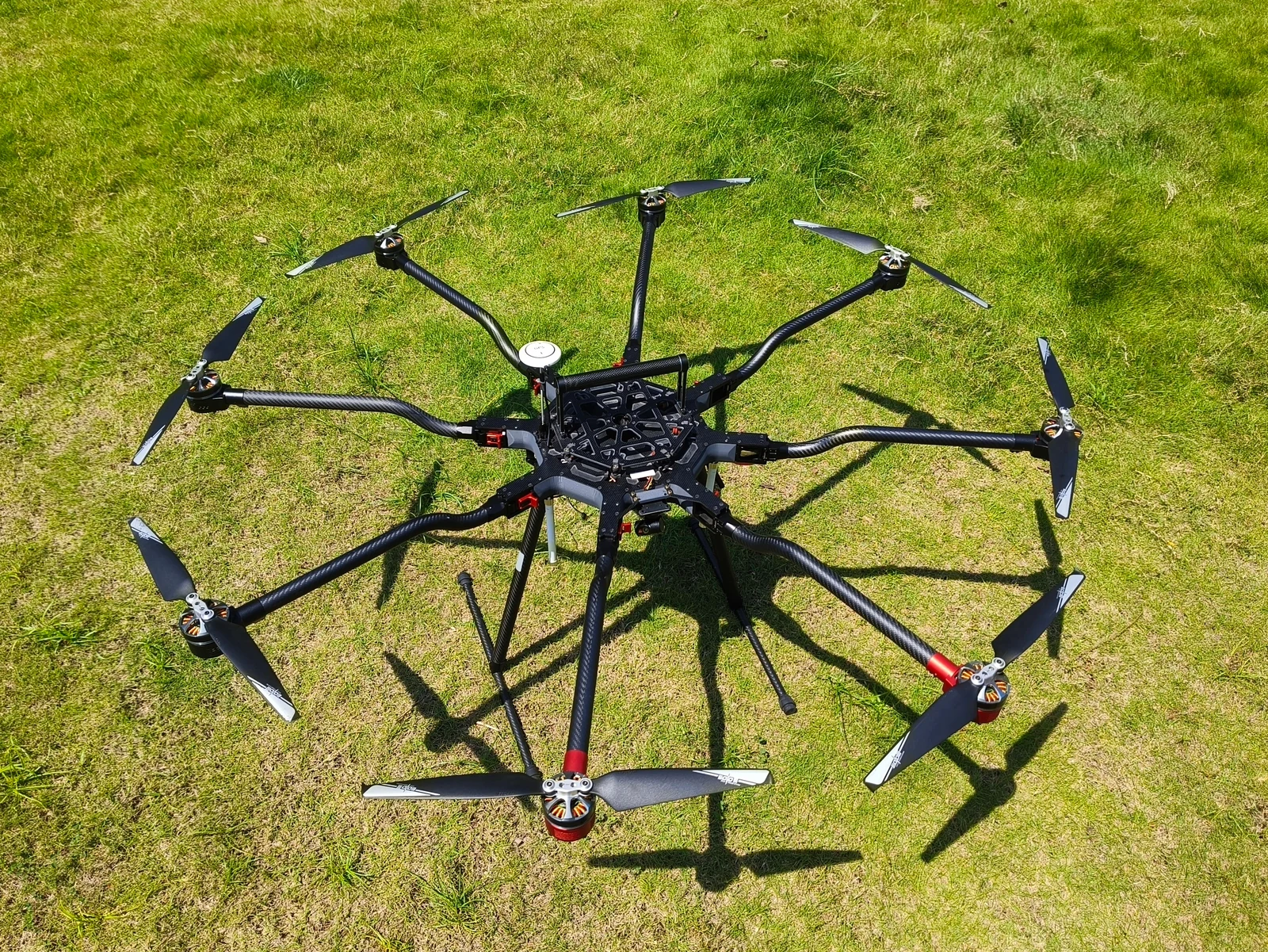 XJ-8A eight-rotor industrial UAV displayed on grass.